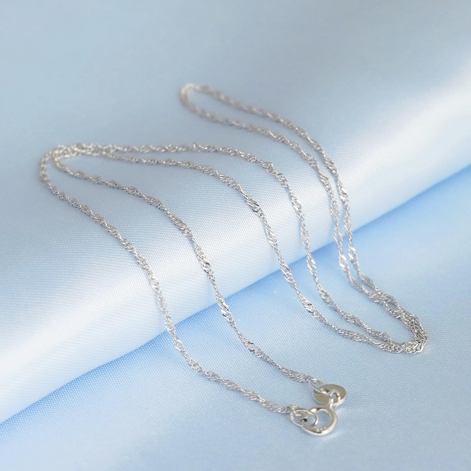 Rhodium twisted chain strands with two small clasp ends