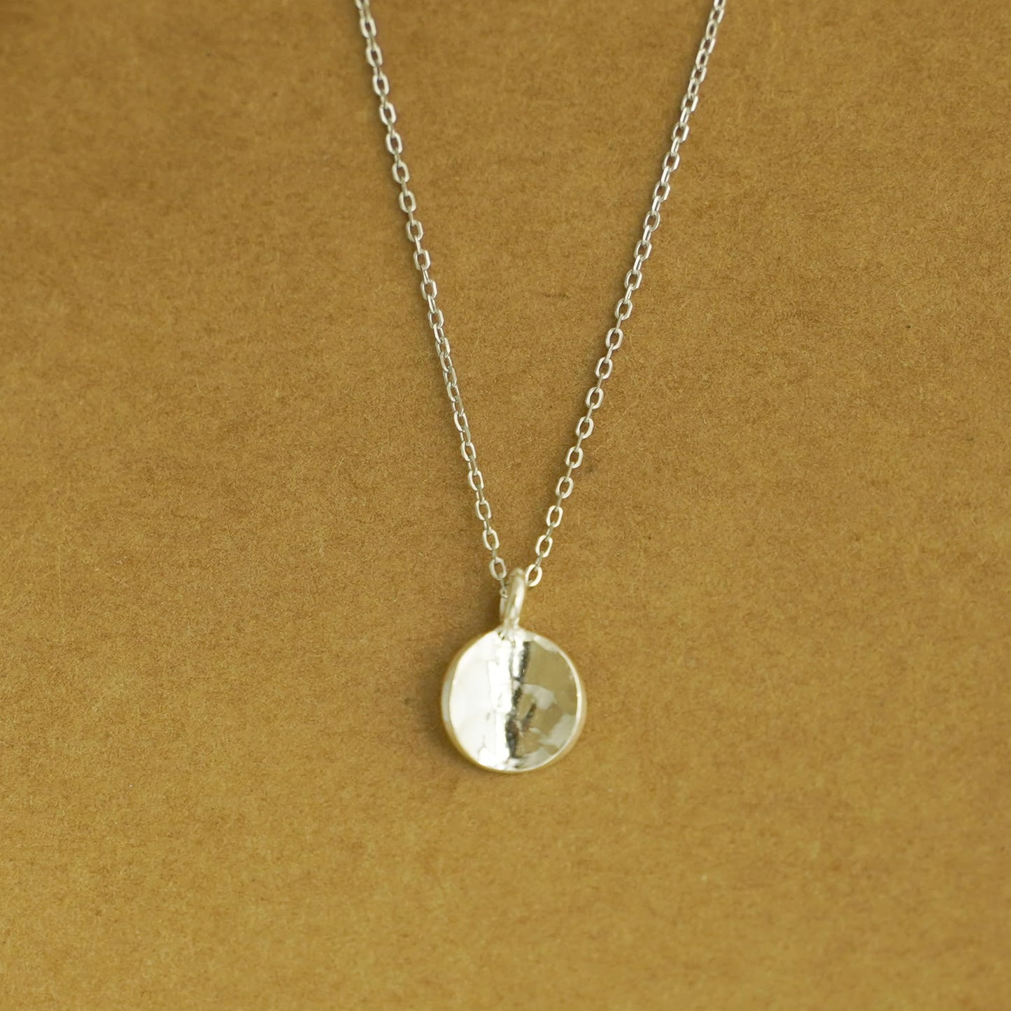 Rhodium curb chain necklace with round mirror-like disc pendant