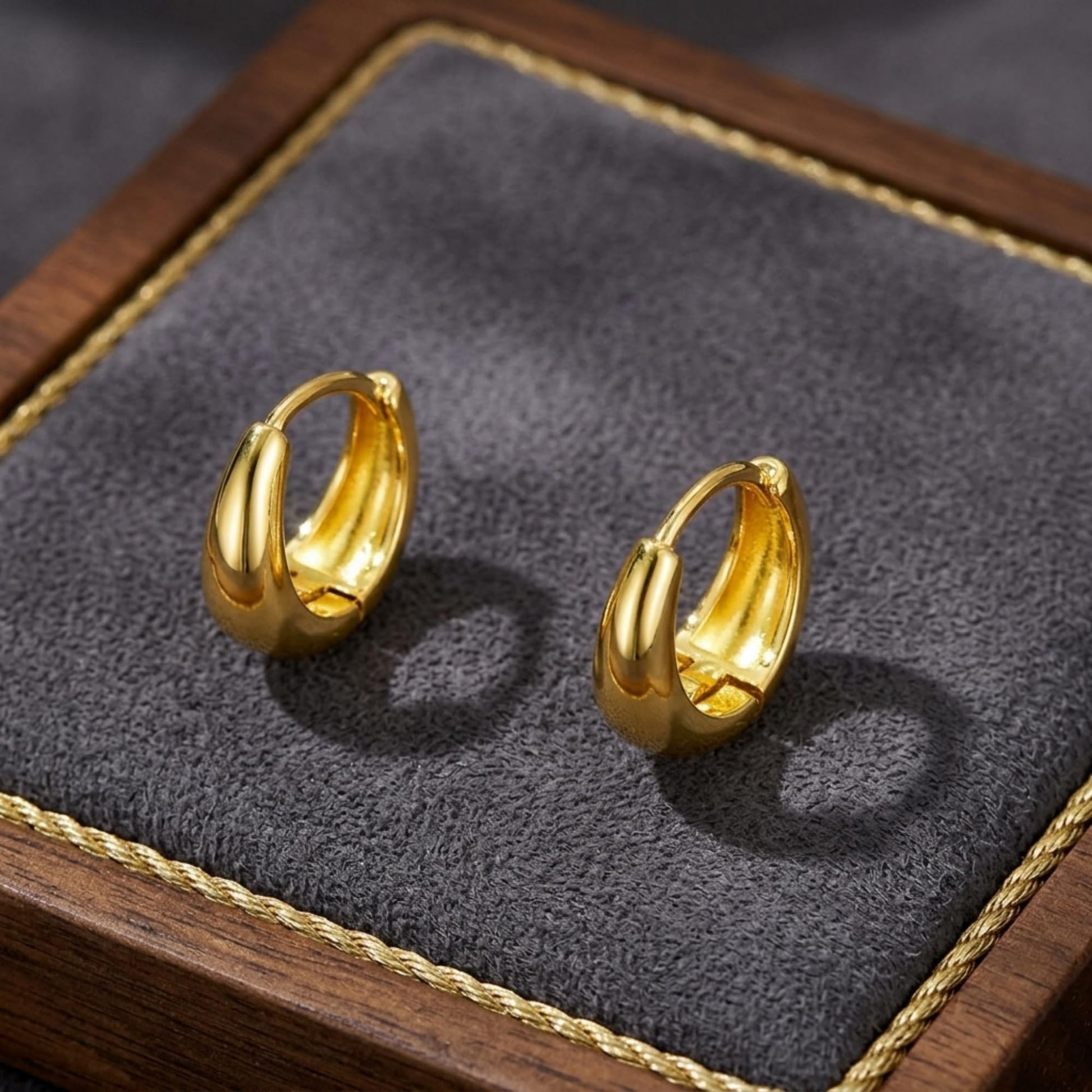 Gold teardrop hoop huggie earrings, pair with inner hinge detail