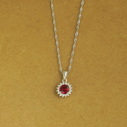Rhodium twisted chain with red gemstone flower halo pendant