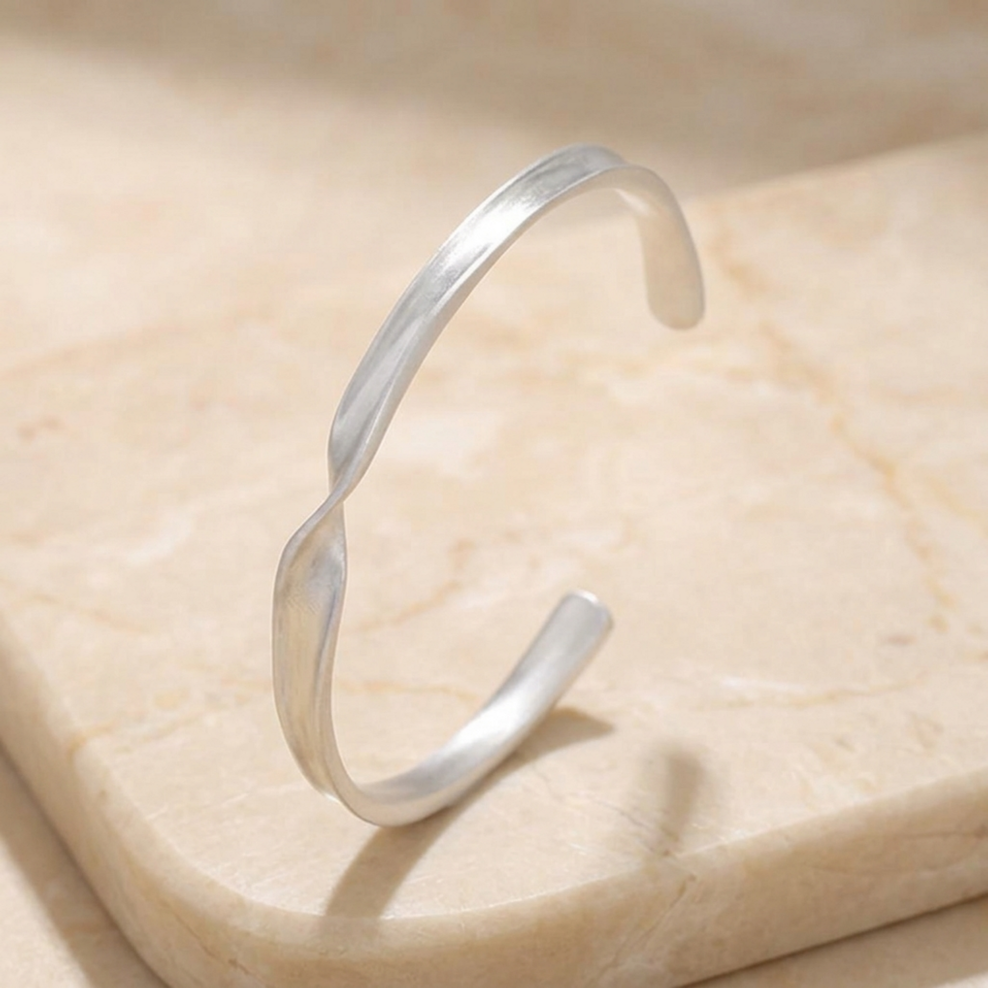 Matte Twist Rope Cuff bracelet side view, silver-tone matte twisted rope design