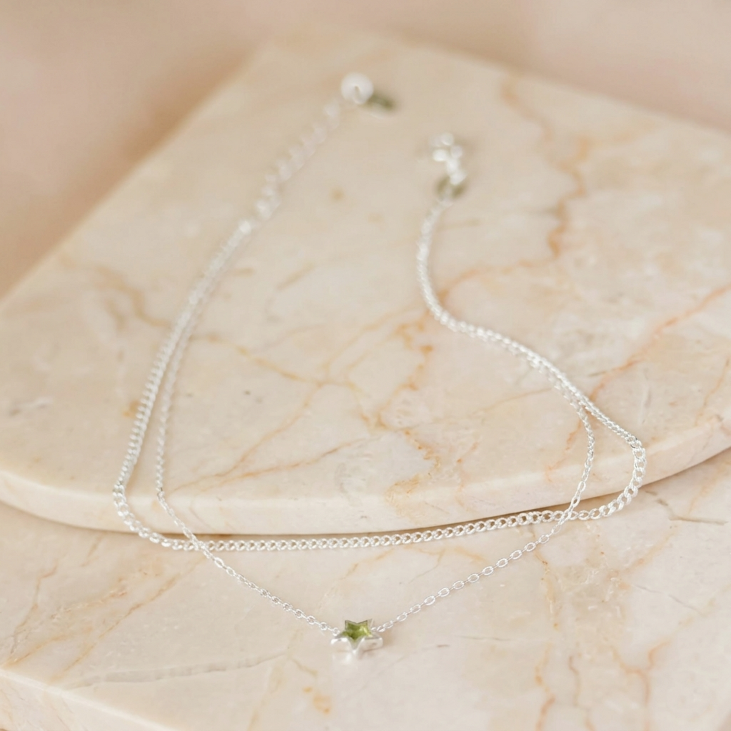Double-layer star anklet with green star charm on silver-toned chains