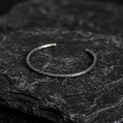 Snake knot cuff bangle close-up, braided snake-knot design open circle
