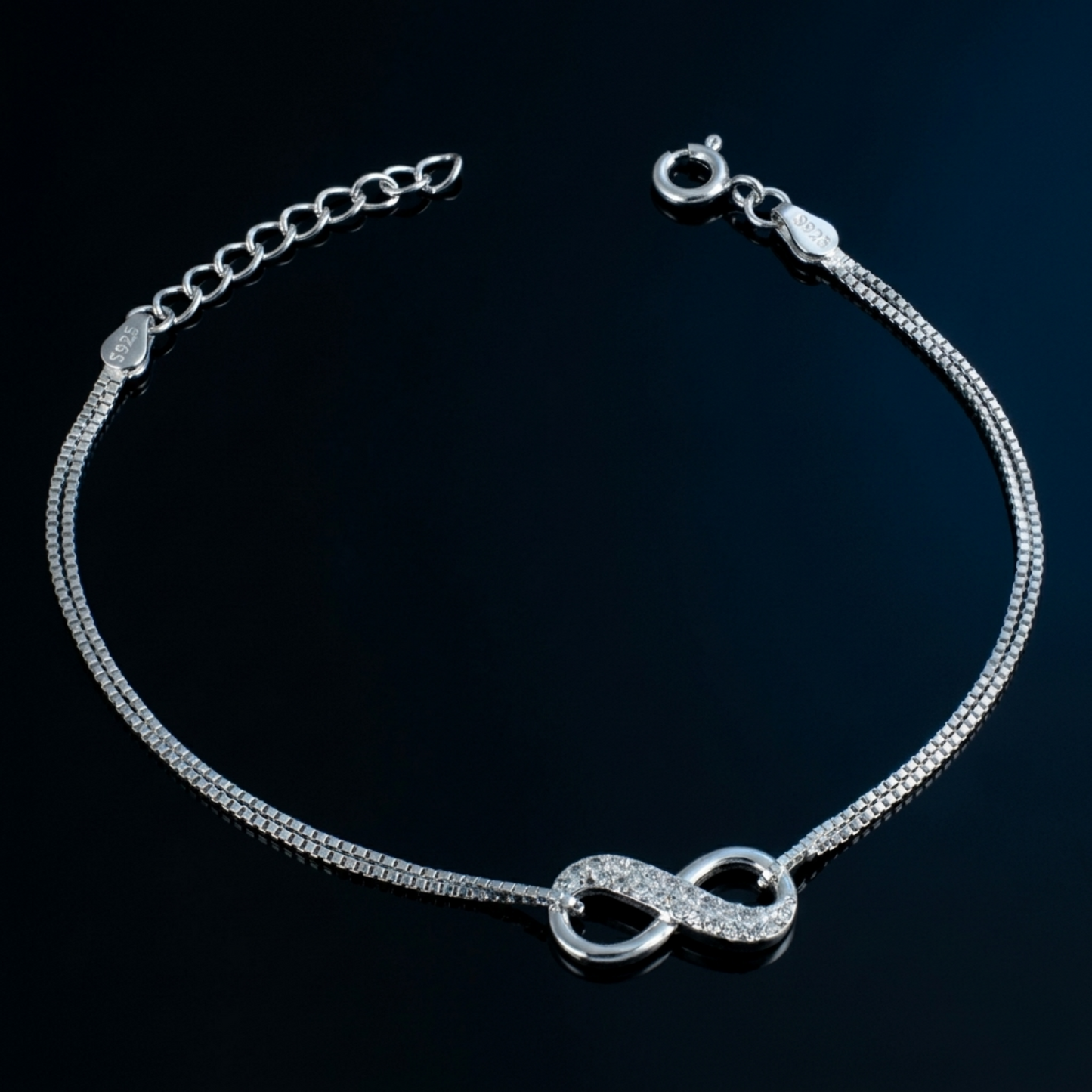 CZ Infinity bracelet, silver-toned chain with infinity link center and round clasp