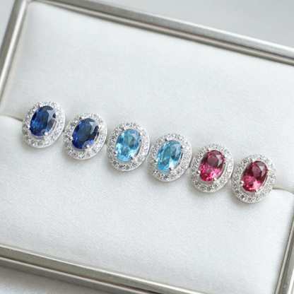 Oval CZ halo stud earrings in aquamarine, sapphire blue and ruby red (multi-pair set)
