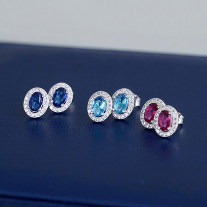 Multicolour CZ halo stud earrings: sapphire blue, aqua-blue and pink oval stones
