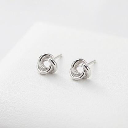 Pair of silvertone Celtic Trinity knot stud earrings with pin posts