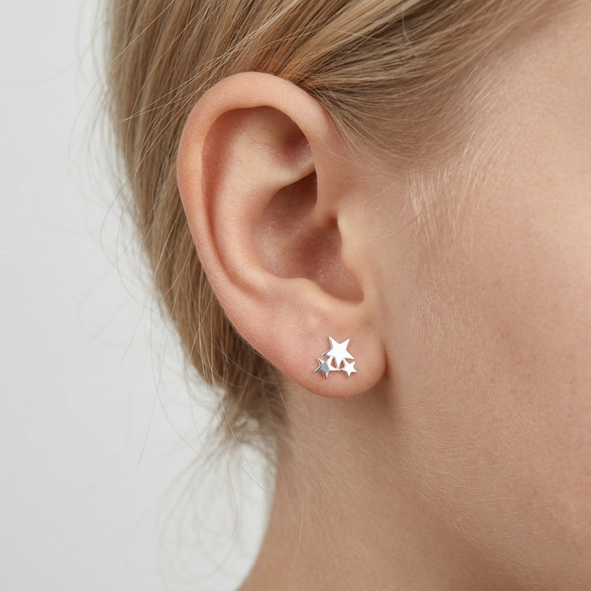 Triple Star stud earrings, small star cluster on ear with secure post