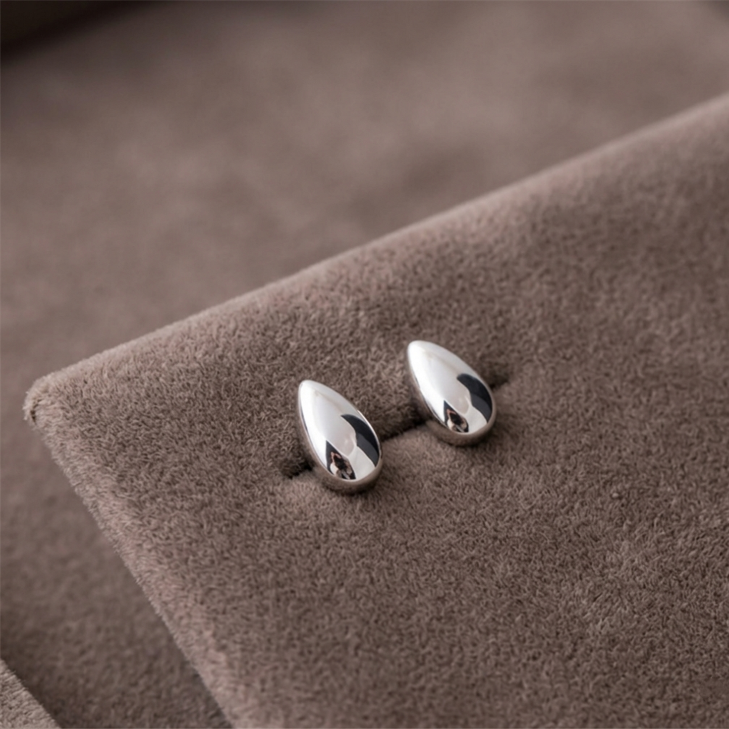 Rhodium teardrop stud earrings, glossy teardrop discs with push-back posts