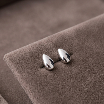 Rhodium teardrop stud earrings, glossy teardrop discs with push-back posts