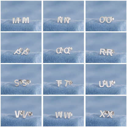 Silver-tone letter stud earrings, close-up initials (M–X) on display