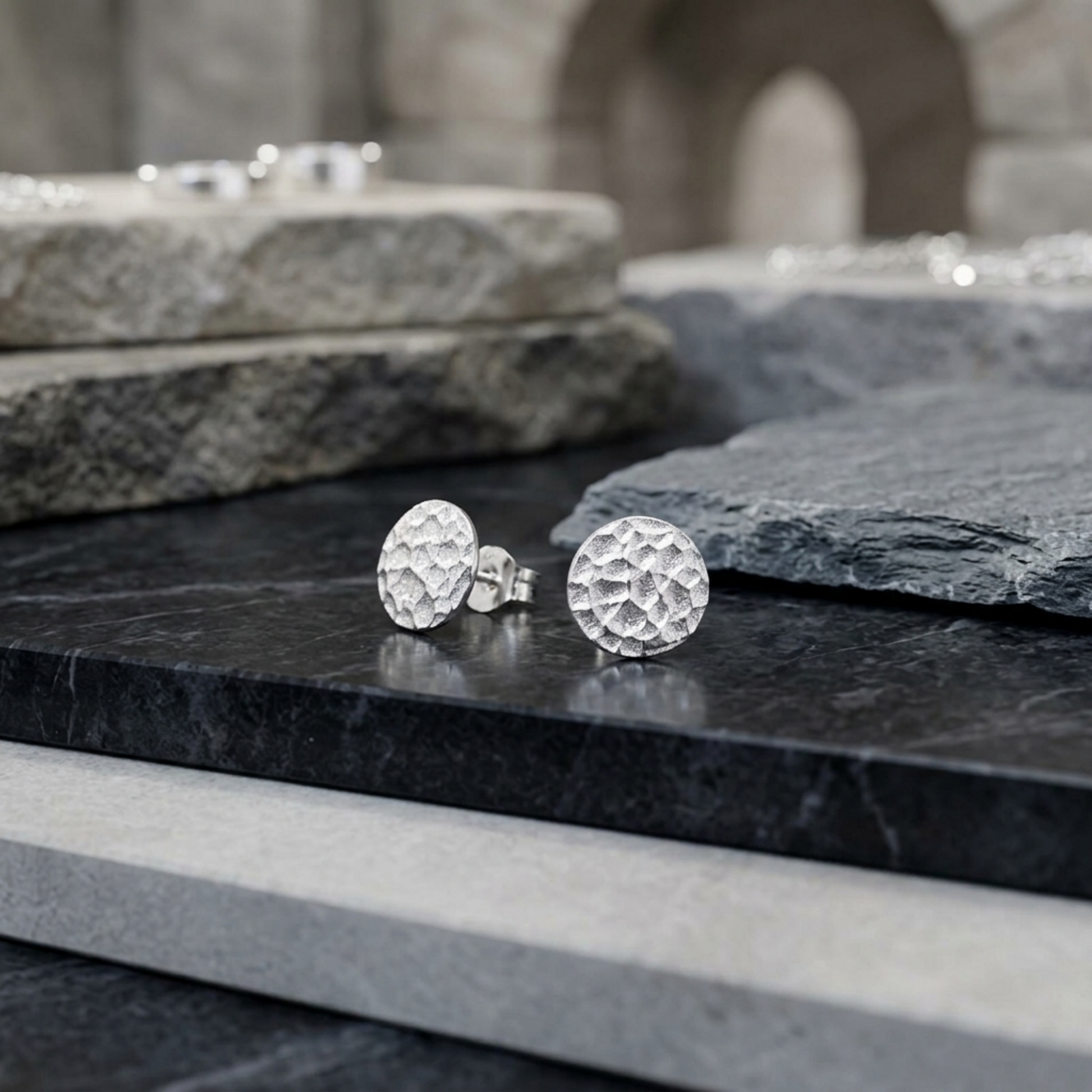 Hammered disc stud earrings on posts, textured silver-tone finish