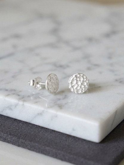 Hammered disc stud earrings, visible backs and posts, silver-tone