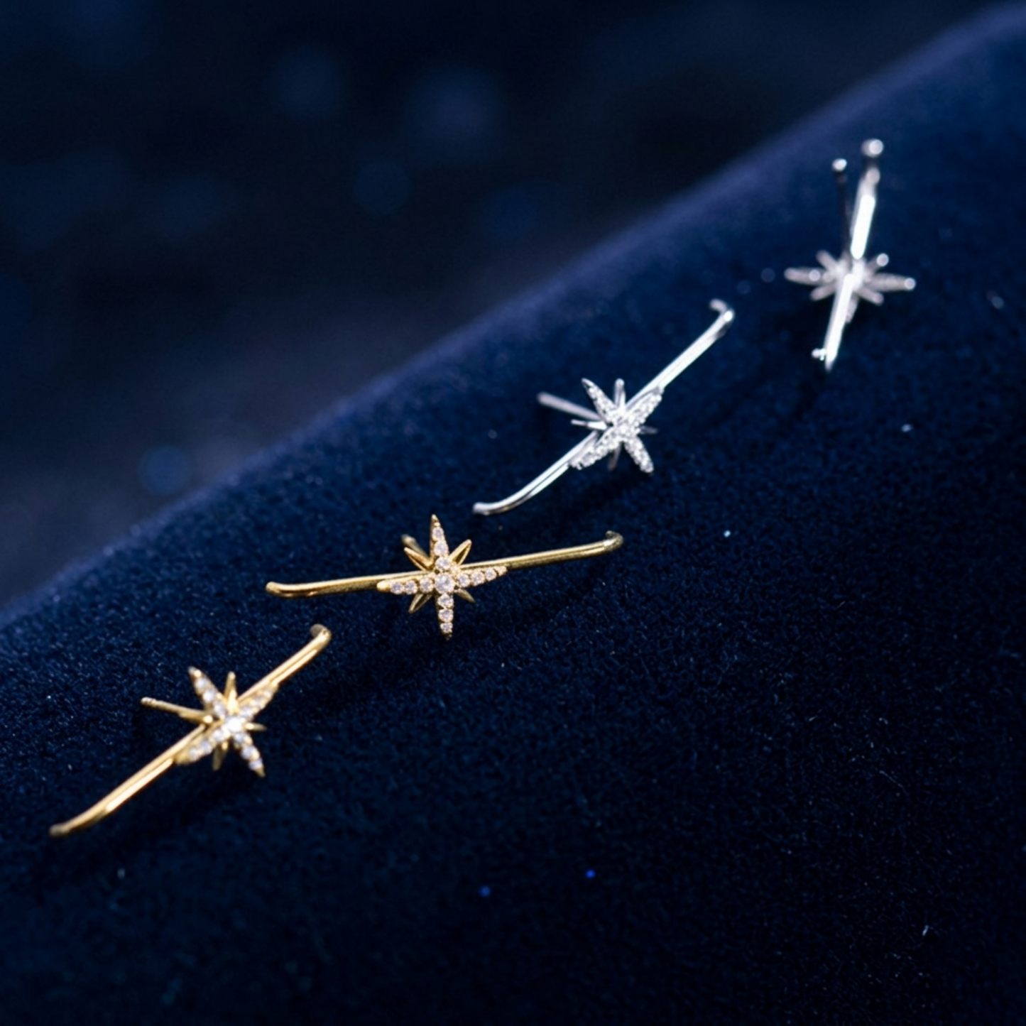 North Star suspender studs assortment: gold-tone and rhodium-tone star designs on cushion