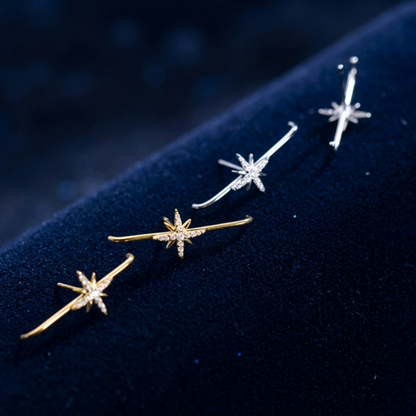 North Star suspender studs assortment: gold-tone and rhodium-tone star designs on cushion