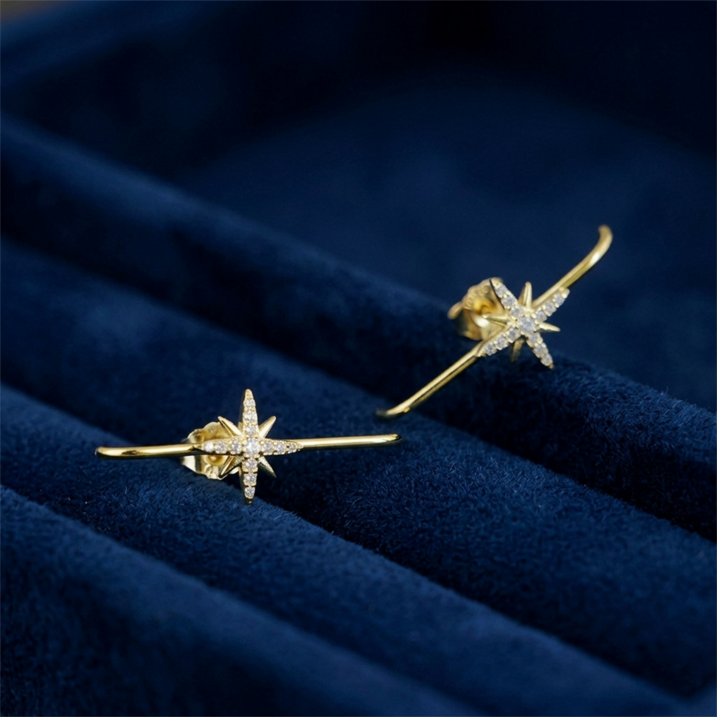 North Star suspender studs in 18K gold-tone, starburst stud with curved bar drop