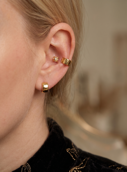 Gold-toned CZ Stacking Eternity Band hinged huggie hoop on ear