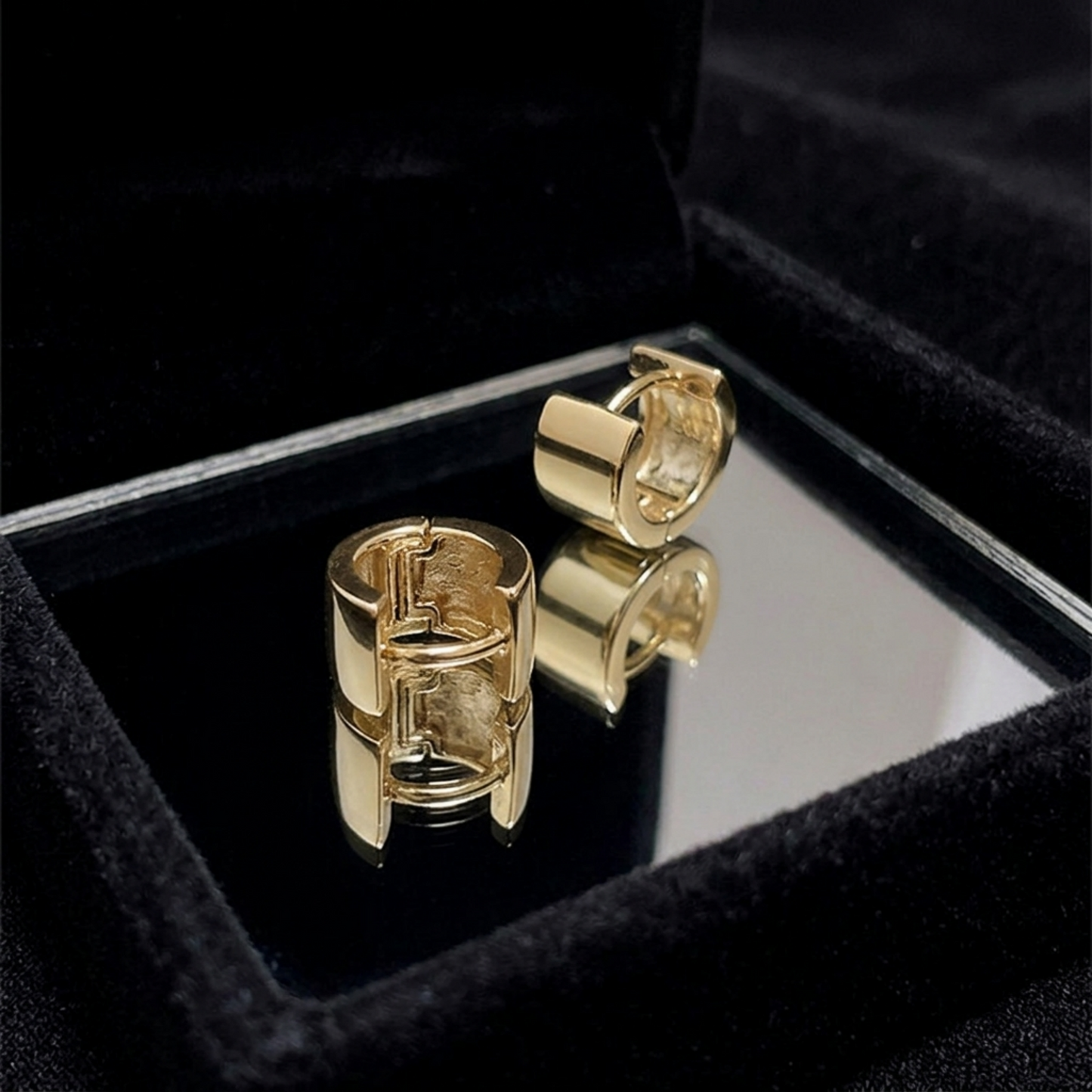 Gold 4.5mm sterling silver hoop earrings with hinged clasp, pair shown.