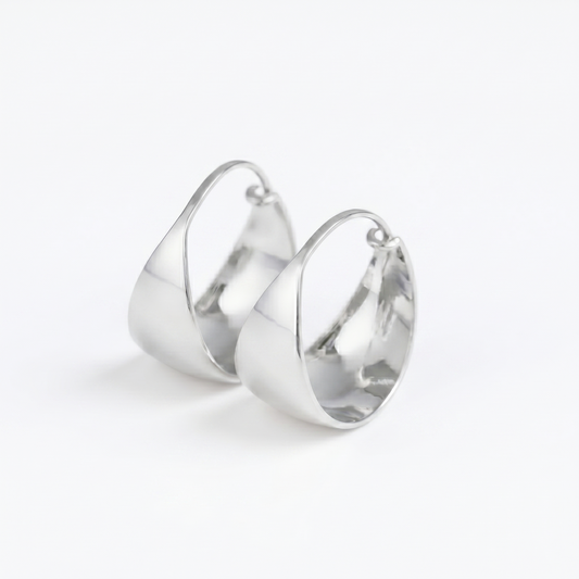 Wide Dome Huggie Earrings, polished silver-tone oval hoop style