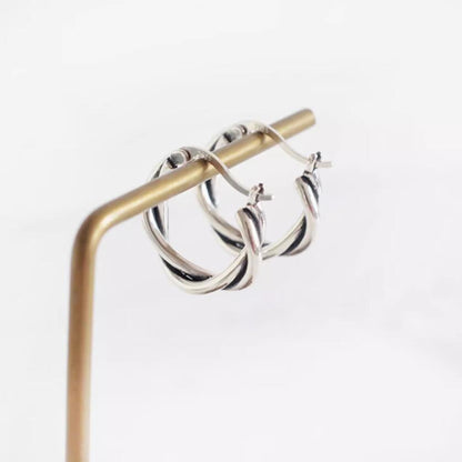 19mm Sterling Silver Oxidized Twist Hoop Earrings with Knot Detail - sugarkittenlondon