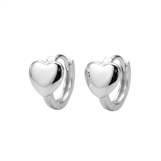 Silver heart huggie hoop earrings, polished heart fronts on hinged hoops