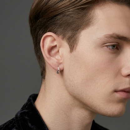 Rhodium 2mm sleeper huggies on ear, small round hoop earring