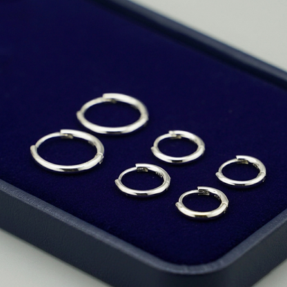 Rhodium 2mm sleeper huggies, small round hoop earrings