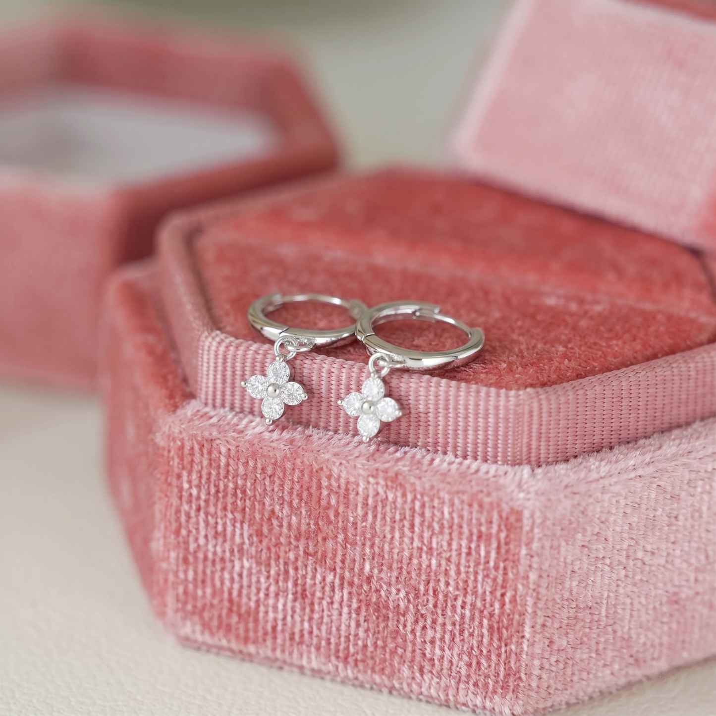 Flower Charm Huggies, rhodium: small crystal flower charms on hoop huggies