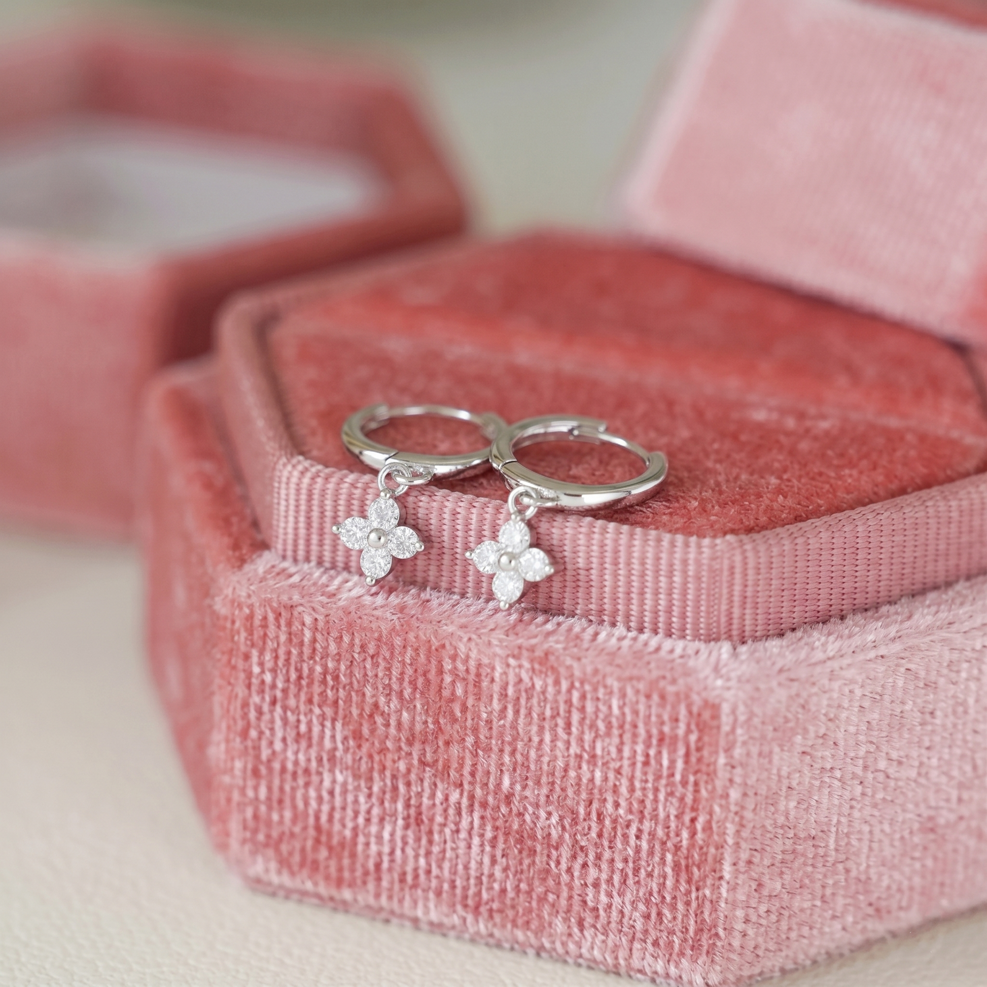 Flower Charm Huggies, rhodium: small crystal flower charms on hoop huggies