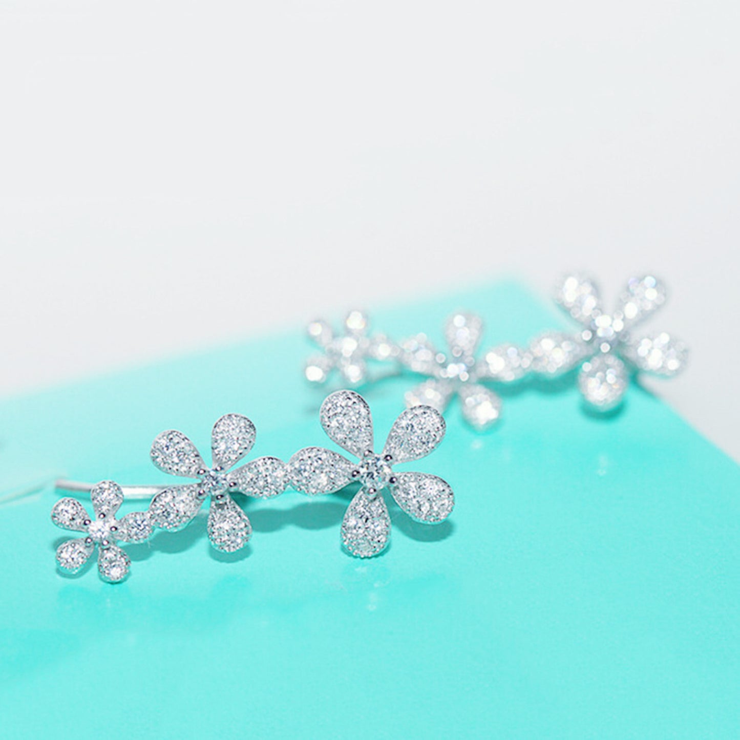 925 Sterling Silver Cuff Drop Earrings with Paved CZ Flowers - sugarkittenlondon