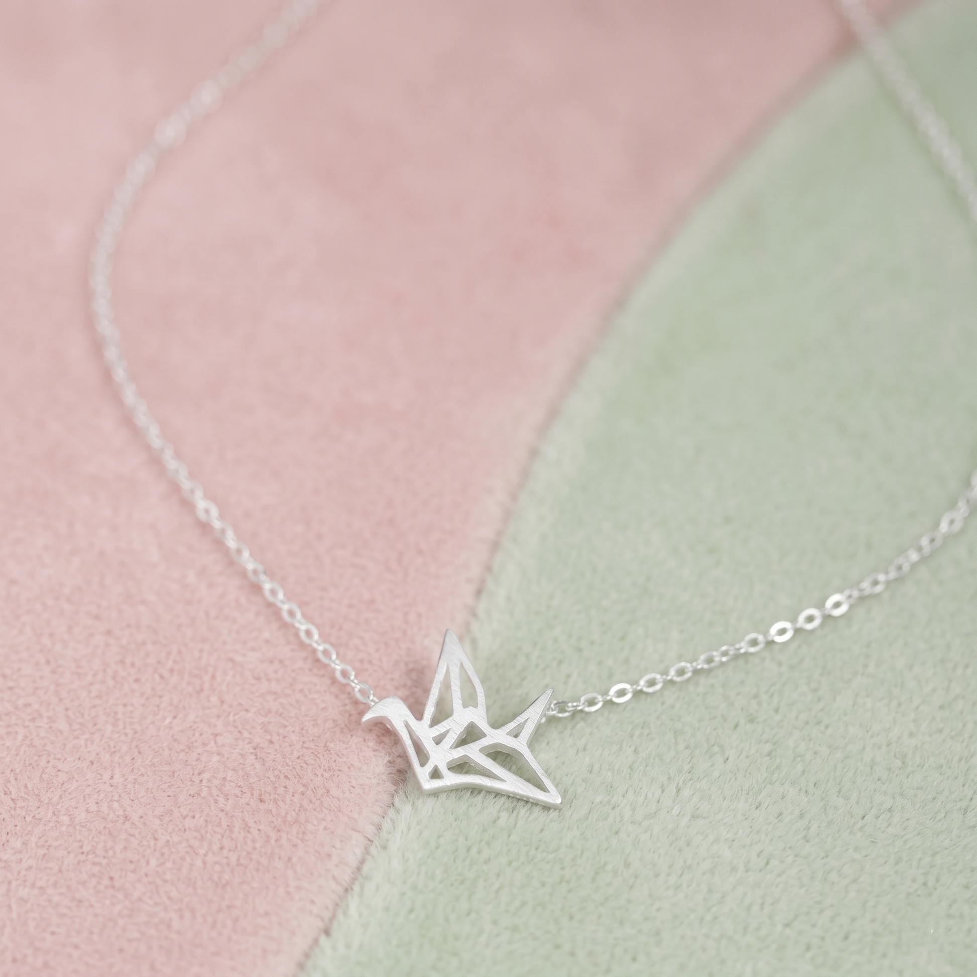 Silver origami crane pendant with delicate link chain