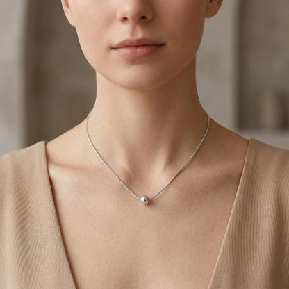 Polished Ball Necklace slim silver-tone chain with polished ball pendant at collarbone