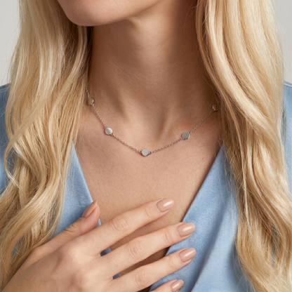 Multi-Disc choker necklace worn on neck with small round disc charms