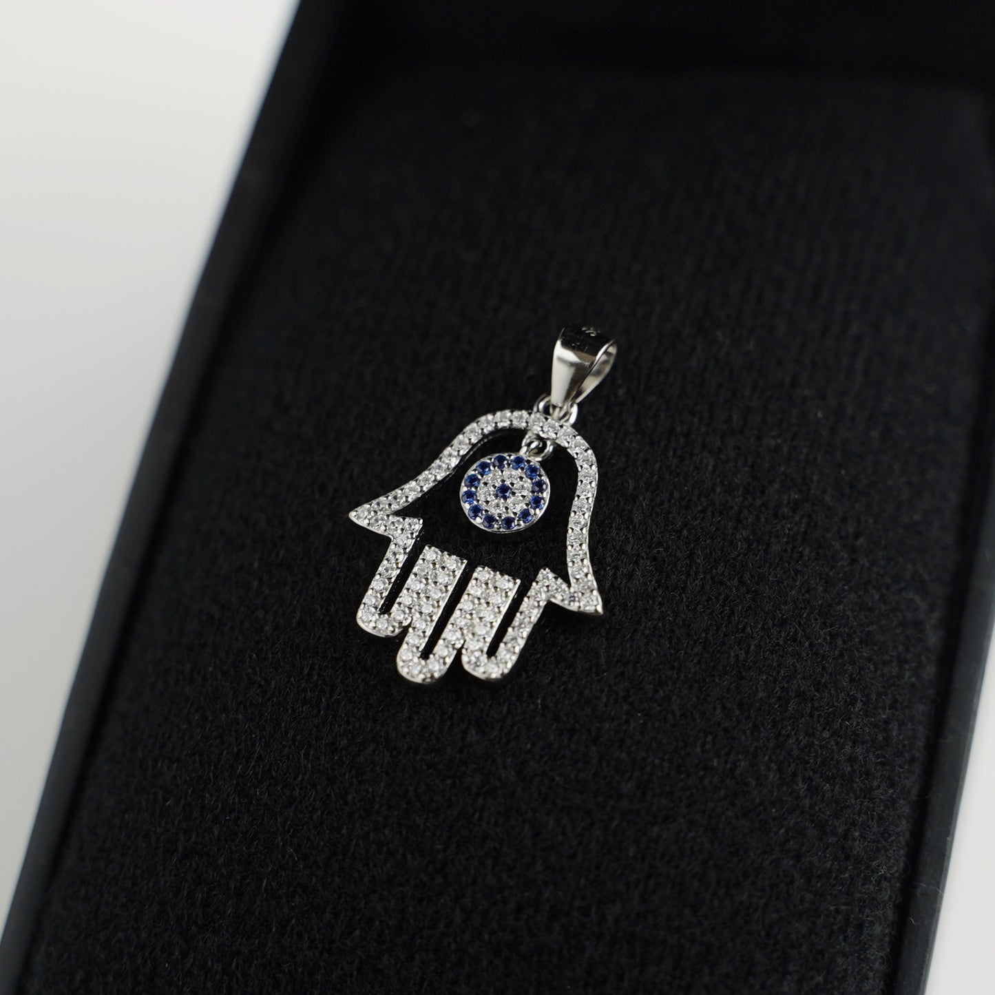 Sterling Silver Hollow Blue Paved CZ Evil Eye Hamsa Hand of Fatima Pendant