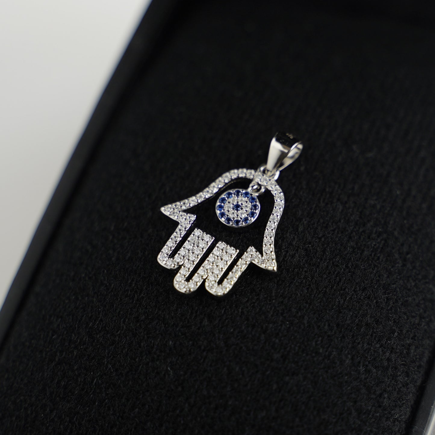 Sterling Silver Hollow Blue Paved CZ Evil Eye Hamsa Hand of Fatima Pendant