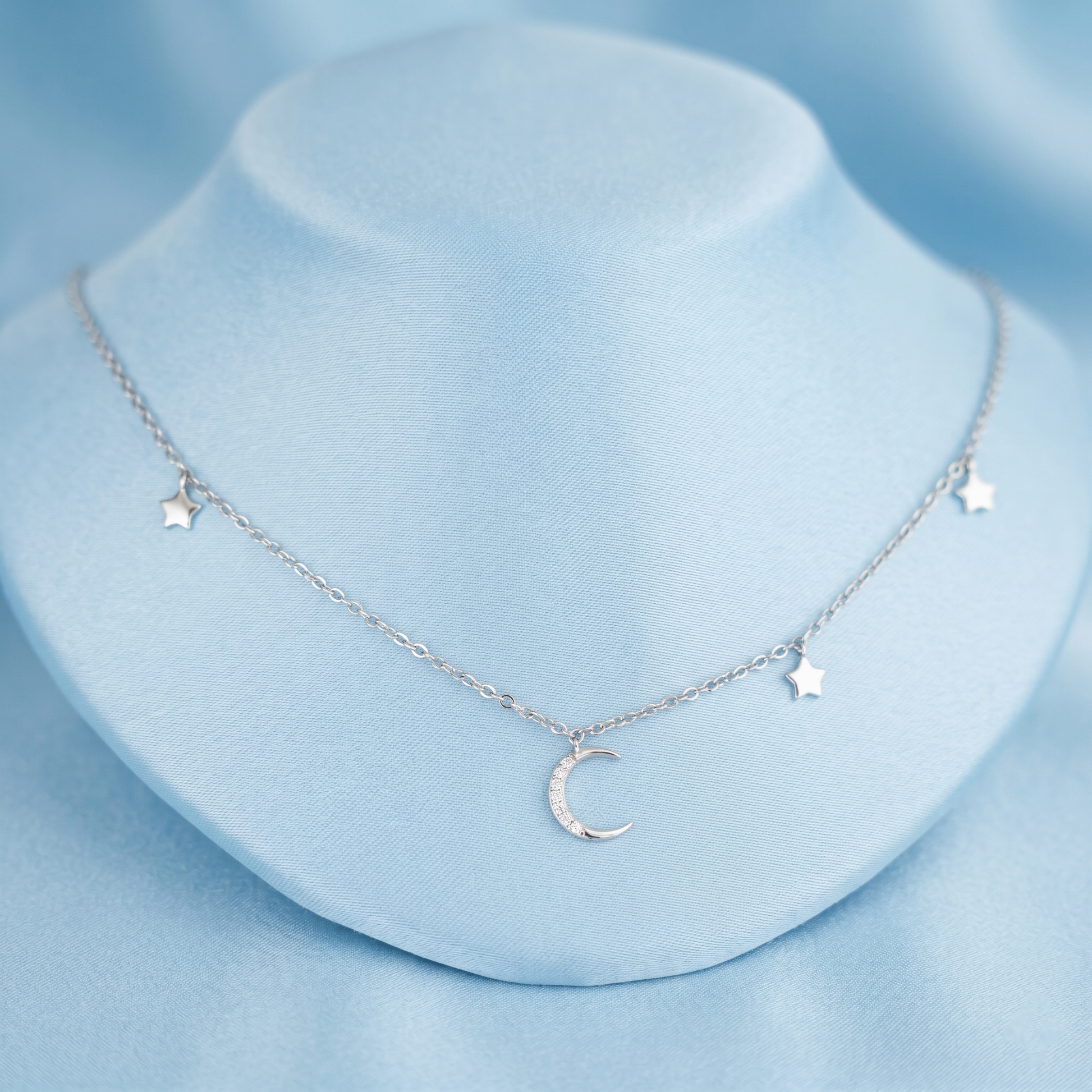 Mini Moon & Star CZ Choker on bust: crescent moon and three star pendants