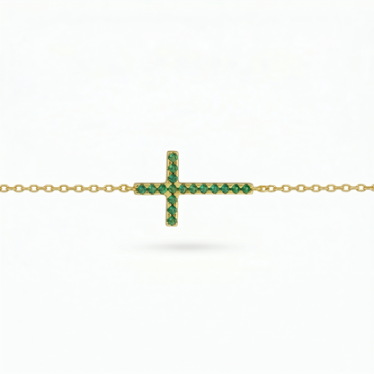 Green CZ cross pendant on gold-tone chain, sideways bar cross design
