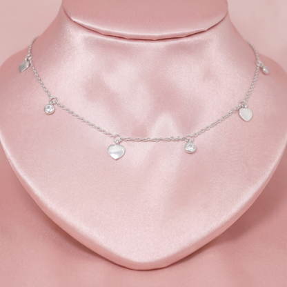 Heart CZ choker showing three mini hearts and round CZ charms on a silver chain