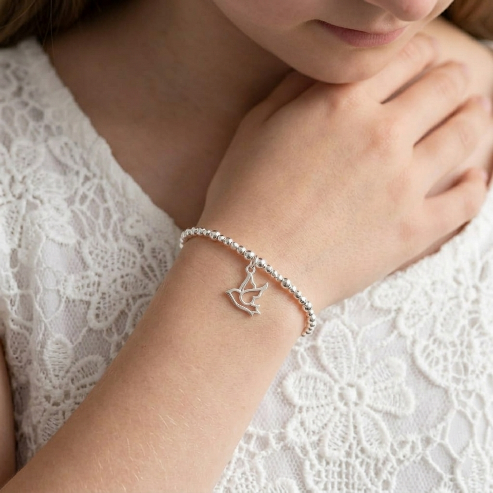 Dove peace charm bracelet with small dove pendant, silver-tone