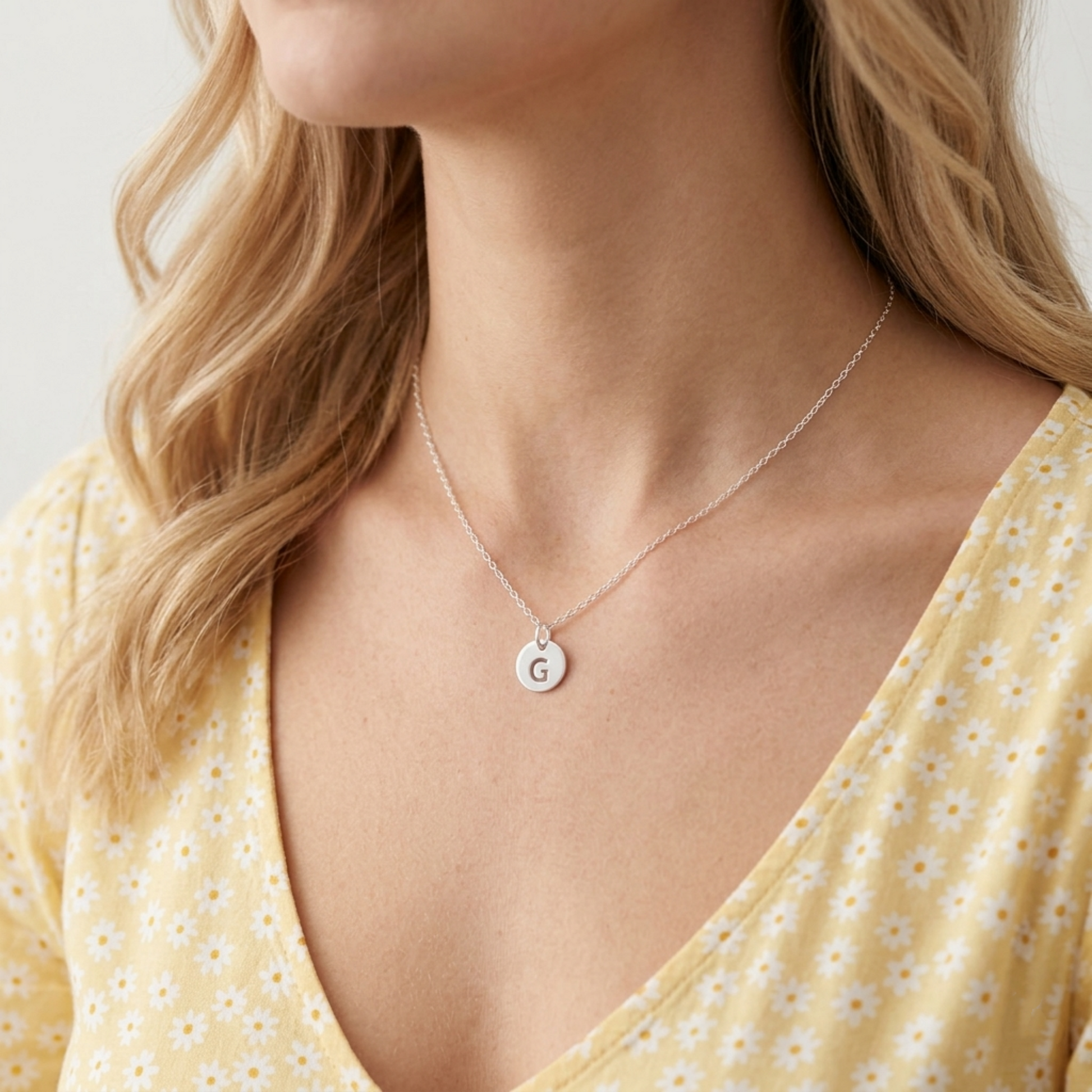 Silver hollow alphabet disc charm necklace with letter G pendant
