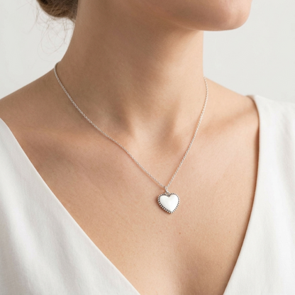 BISELTD silver heart charm pendant with beaded edge on a chain