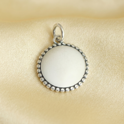Oxidised beaded circle charm pendant, round disc with bead rim and loop bail