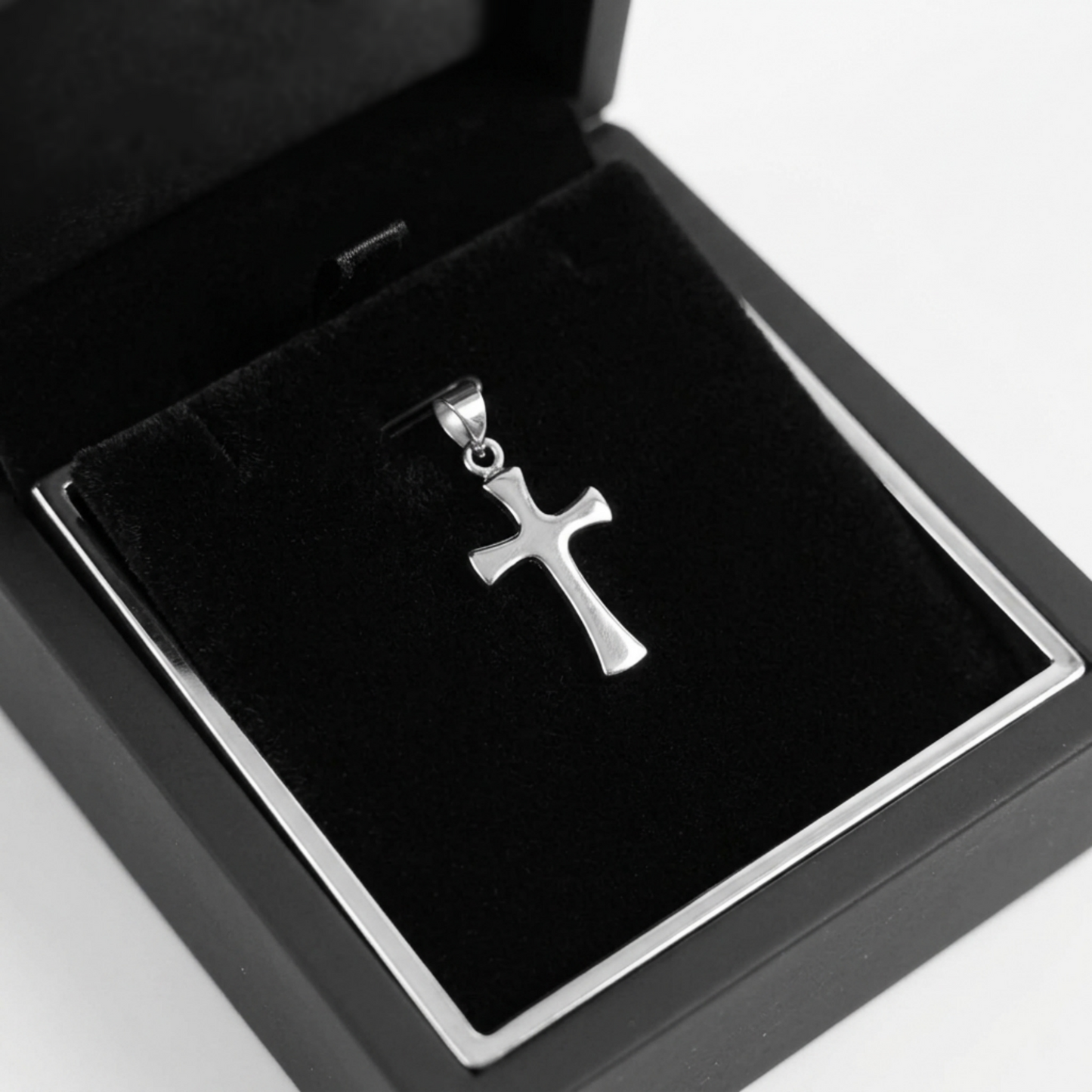 Silver-tone flared cross pendant, polished finish with loop bail
