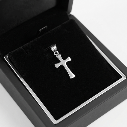 Silver-tone flared cross pendant, polished finish with loop bail