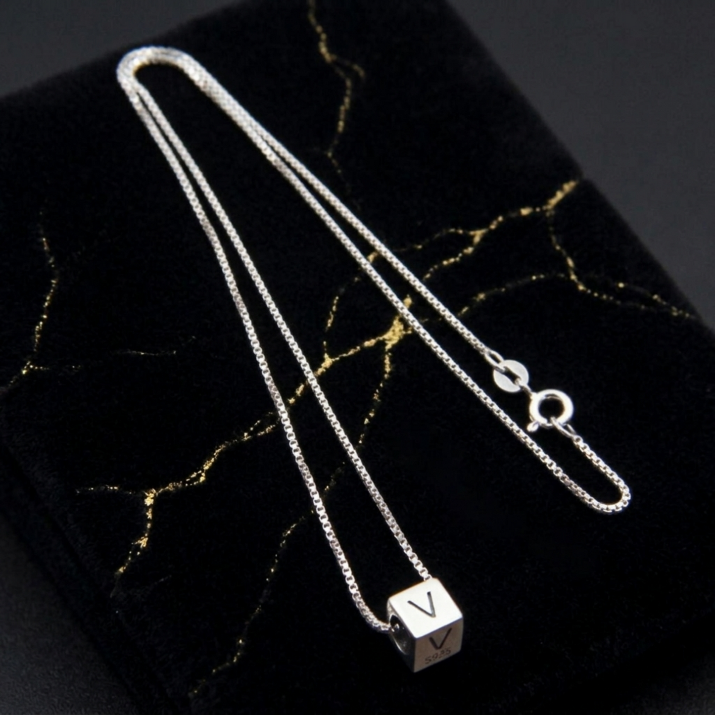 Alphabet cube bead necklace with a single V letter pendant and silver chain