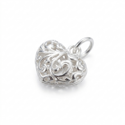 Silver-tone filigree floral puffy heart pendant, side view