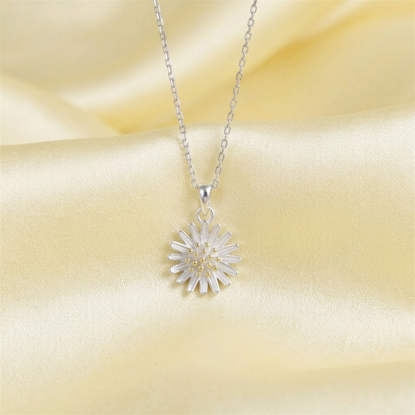 Silver daisy flower necklace pendant with gold center and chain