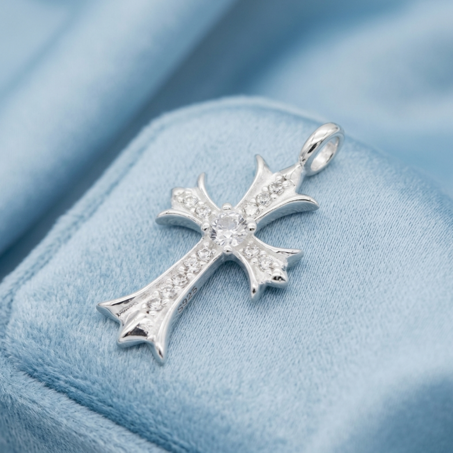 Silver CZ cross pendant with “S925” marking on the bail side