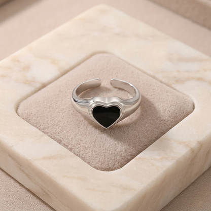 Wishbone heart ring with black enamel heart and silver edging