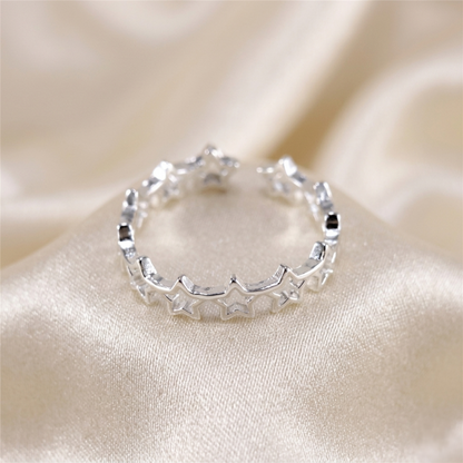 Silver-tone Lucky Stars ring, top view with star link band
